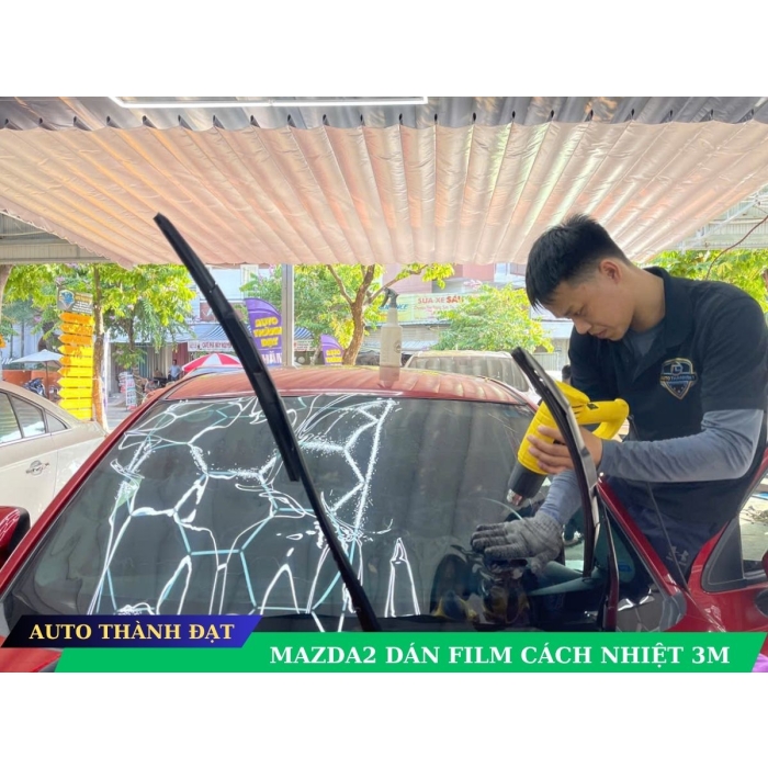 dán film cách nhiệt xe MAZDA2
